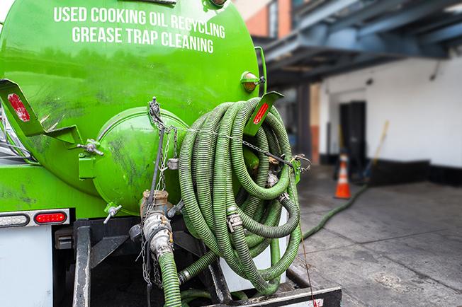 Grease Trap Cleaning of Temple workers